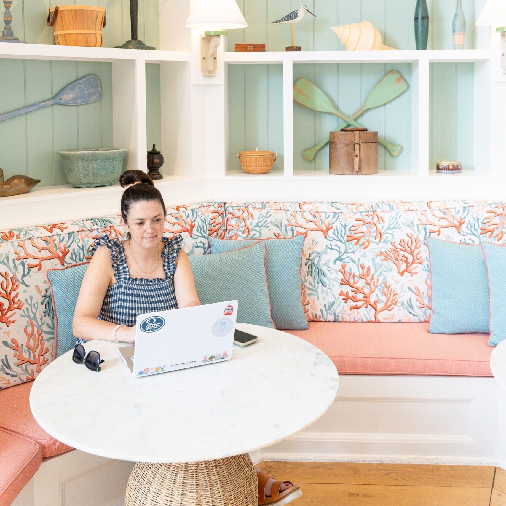 Kelli Creates Magic working on laptop Disney's Beach Club Resort